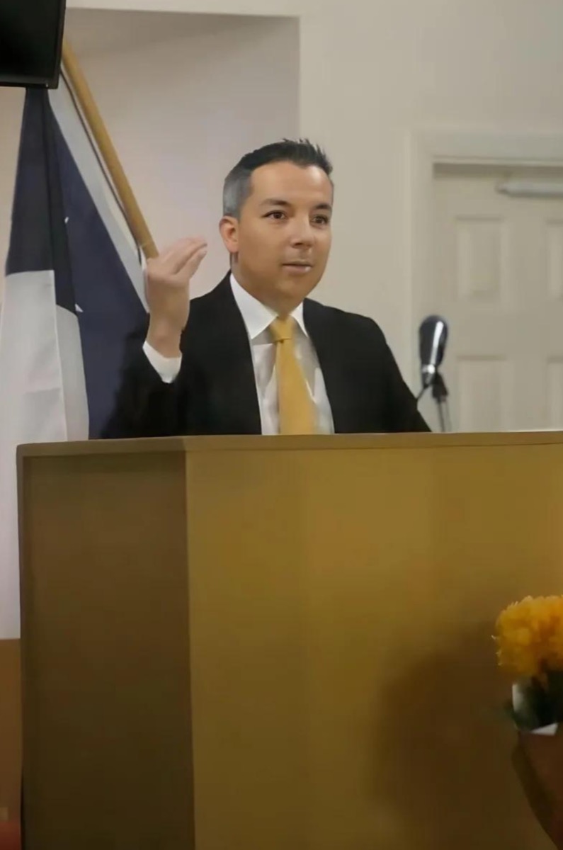 Pastor Enrique Reyes preaching at SpringCrest Baptist Church